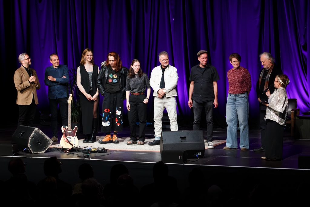 Das SLAM 2026 Team auf der Bühne